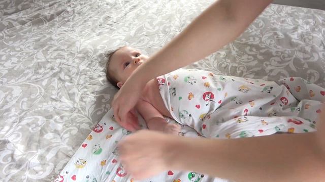 Пеленание новорожденного