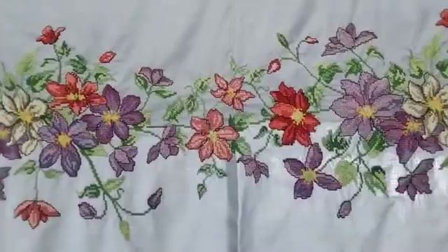 beautiful multicolor cross stitch design of clematis flower for dresses and lehangas (skirts) etc