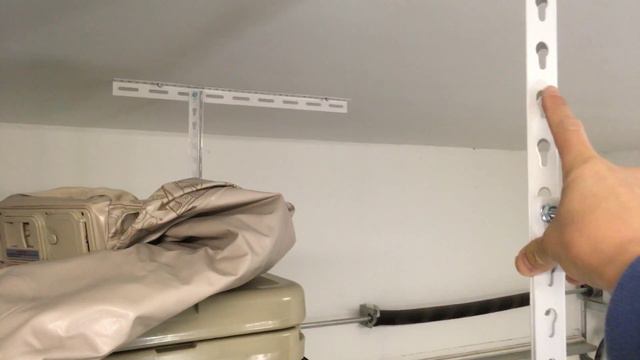 Install Costco overhead garage rack