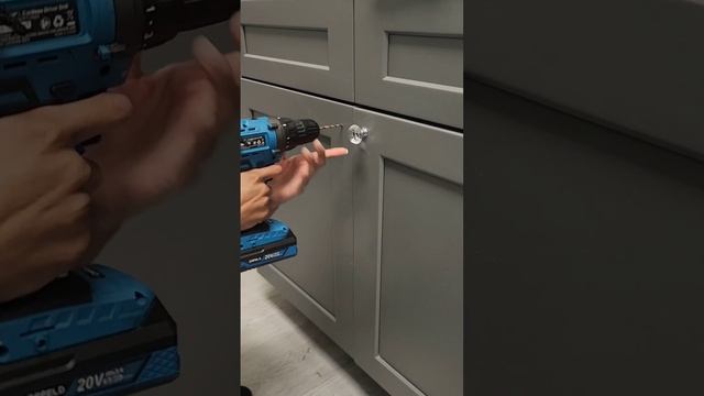 Installing Custom Crystal Knobs on our studio cabinets and drawers!