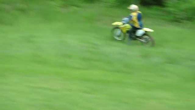 2009 rmz250 small jump and wheelie