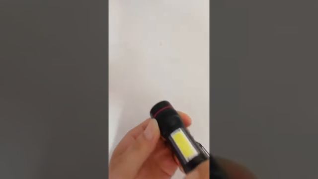 Фонарь аккумуляторный ручной с мини зумом  светодиодный