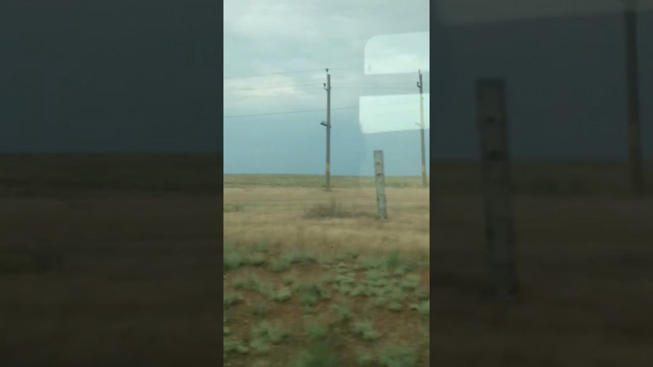 Полупустыня за окном поезда Астрахань Волгоград Semi-desert outside window Astrakhan-Volgograd train