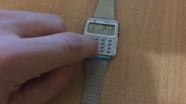 Armitron calculator game piano watch