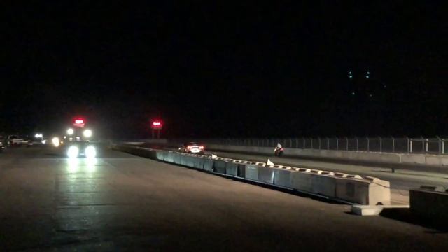 1000 Hp Nissan GTR vs race motorcycle.