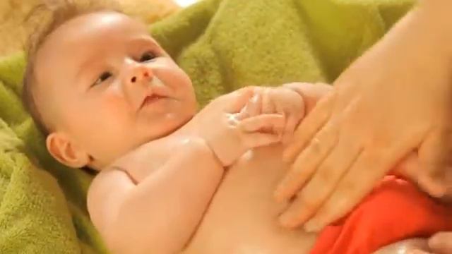 Weleda  Baby massage with Weleda Calendula Oil