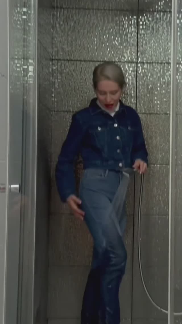 Miss Viki bathes in her denim clothes