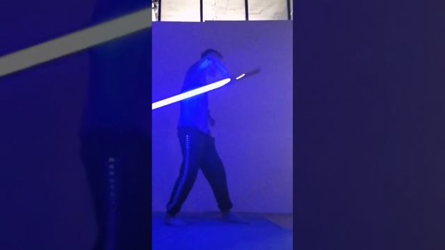 jedi with blue lightsaber