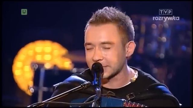 Біля тополі