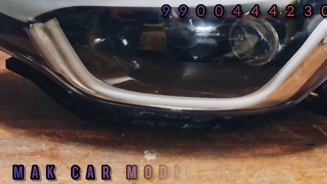 I.20 elite headlights converted from basic to dual projector installed projector of Innova crysta