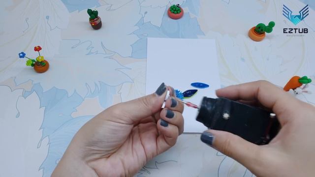 Discover the Magic of Evolvulus Alsinoides Flowers! Create Your Own Quilling Garden Today!