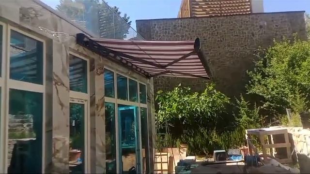 Маркиза, установка в коттедже на летней террасе