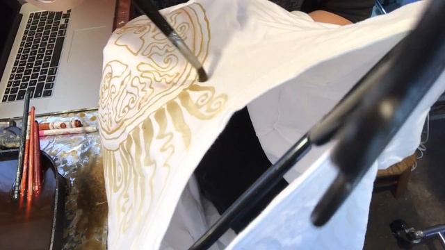 Painting A Batik Tree Design On A Tshirt With Beeswax