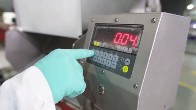 Полуавтоматический бункер дозирования продукции. Производство конвейерных систем OKZO SYSTEMS