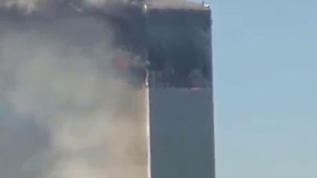 Видео с терактов 11.09.2001, где подробно видны обрушения двух башен Всемирного торгового центра