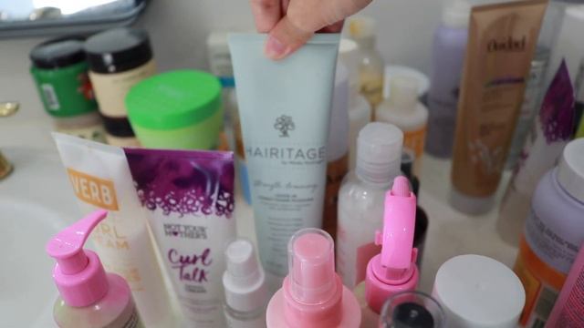 my ENTIRE wavy/curly hair product collection!! declutter & organize with me