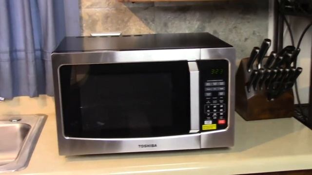 Toshiba EM131A5C-SS Microwave Oven with Smart Sensor Easy Clean Interior ECO Mode and Sound OnOf
