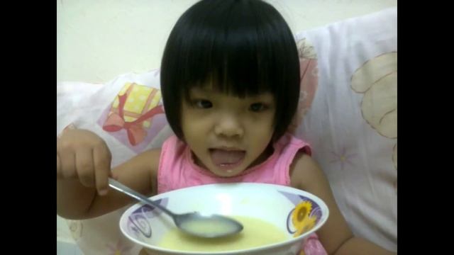 Two Years Old Baby Drinking Soup By Herself