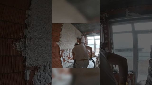 Нанесение штукатурки станцией