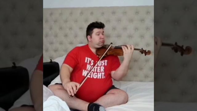 Nikocado Avocado plays his violin.