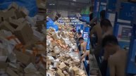 Как роботы: по посылке в секунду обрабатывают работники склада в Китае