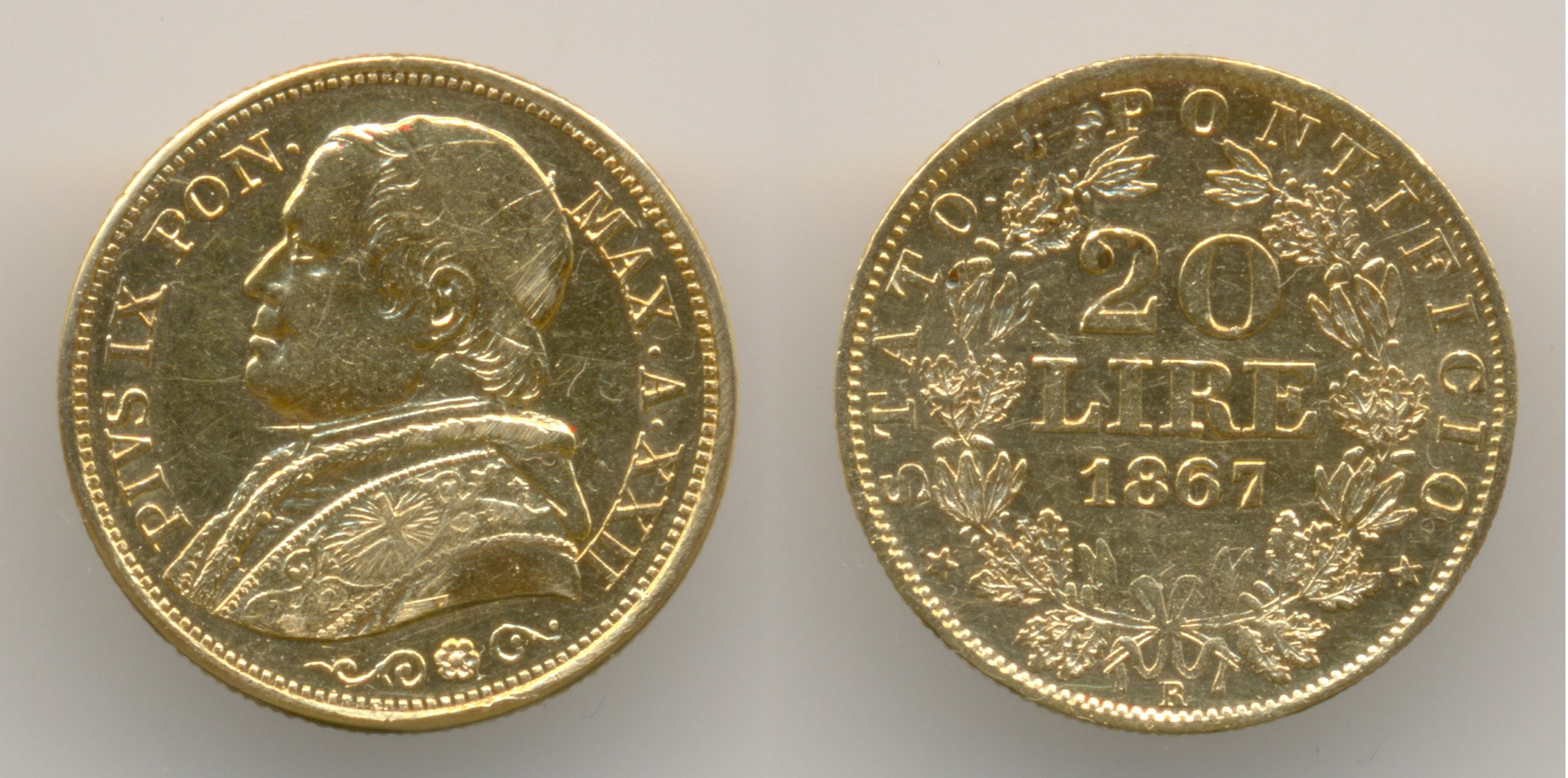 Нумизматика. Золотая монета. Папская область, 20 лир 1867 г.