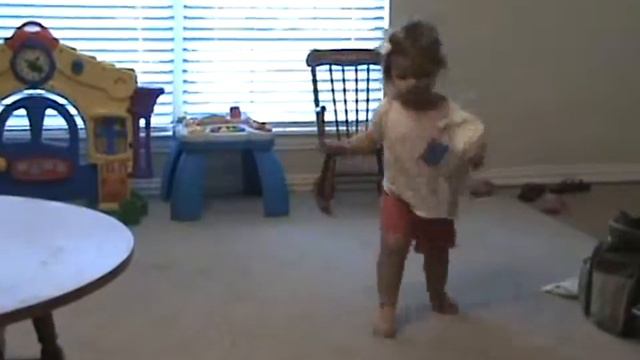 Adelae Waving Her Flag and Dancing