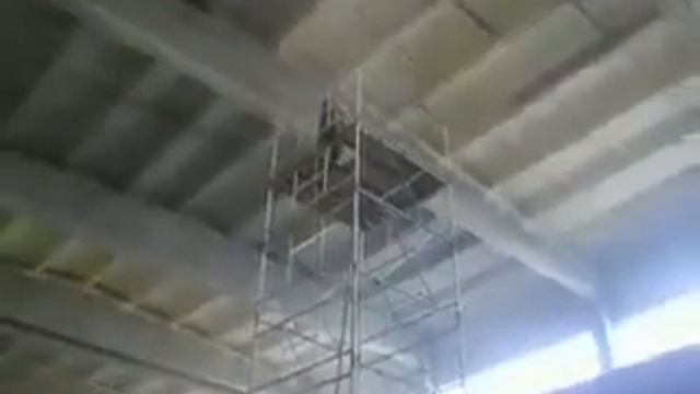 Теплоизоляция методом напыления на потолок.