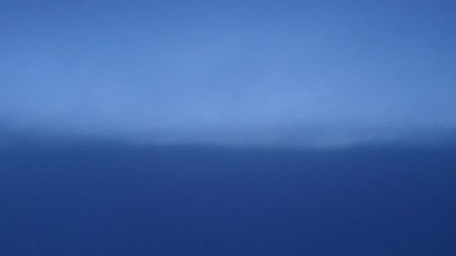серебристые облака и восход солнца во время полёта.