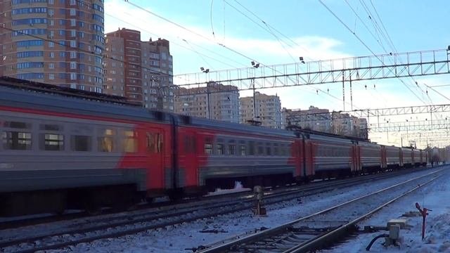 Электропоезд ЭД4М-0335 в новой окраске PID, станция Железнодорожная