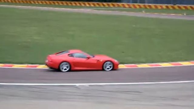 Drifting Ferrari 599 GTB Fiorano HGTE on race track Maranello / Fiorano