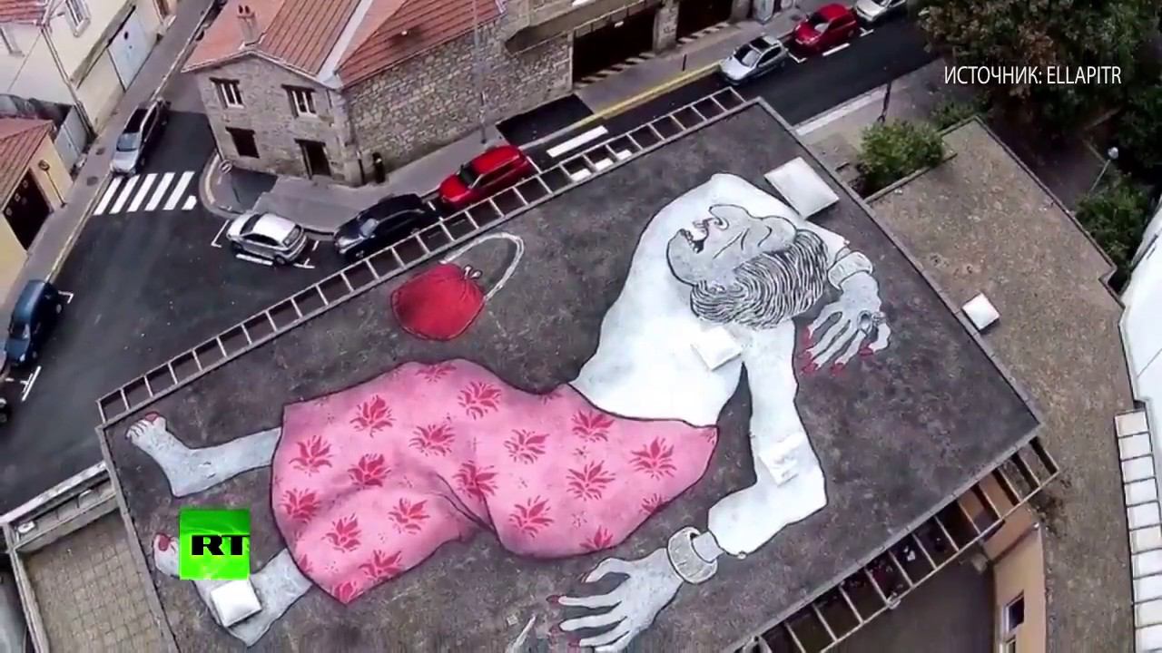 FRANCE  View from the Top: french duet draws art monumental graffiti of sleeping people