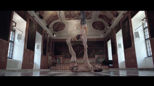 Duo Performs Beautiful Acroyoga Flow
