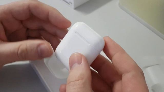 Распечатка, unboxing наушников AirPods от Apple