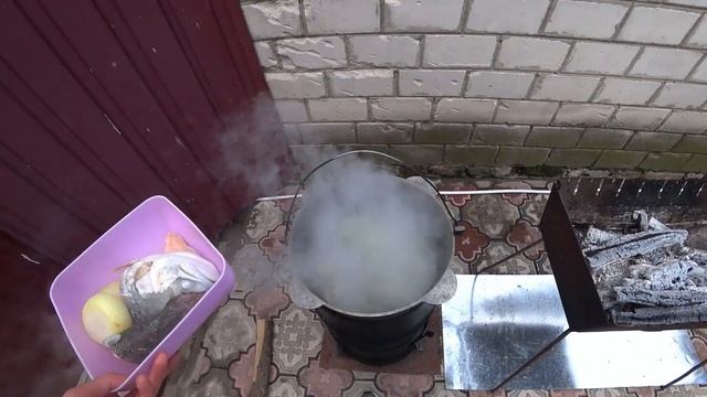 Royal wood fired fish soup! Fish soup recipe in a pot on the bonfire