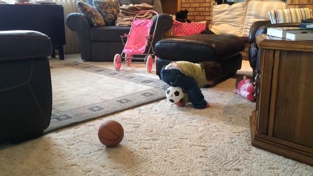 Kira Rose with soccer ball and basketball
