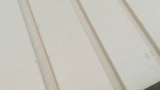 Insulate garage door with pipe foam