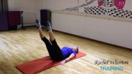Practicing the Pilates "Roll Over" Exercise