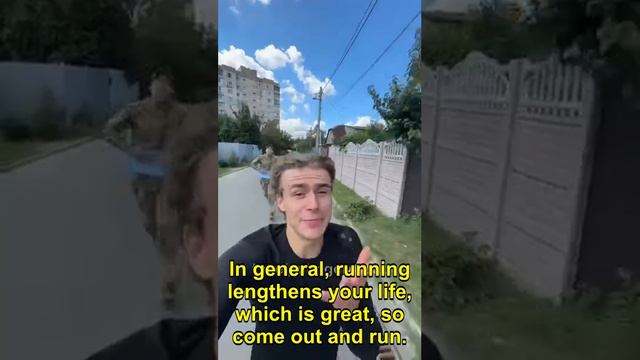 Just a regular happy young man out jogging and enjoying himself in Kharkov.