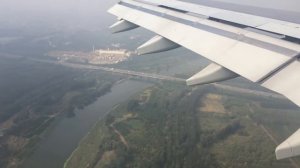 Approach and landing on Beijing (PEK) International Airport, China.