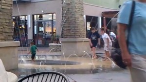 The kids playing at the fountains part 1