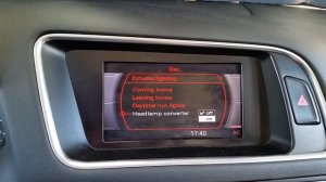 Как отключить режим освещения для левостороннего движения Audi Q5