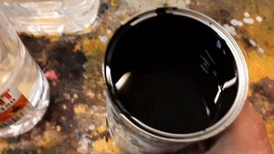 Покрасить бампер в чёрный цвет краской по пластику.