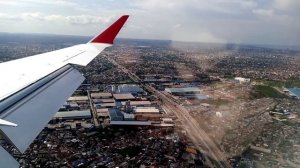 Sky Tour 09 - Uganda Airlines Landing at Julius Nyerere Airport (Tanzania) over Dar es Salaam City