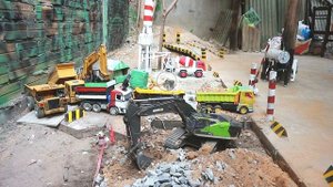 The Excavator Huina 1593 cutting BRUDER TOYS TRUCKS construction site / sand and Rocks transport