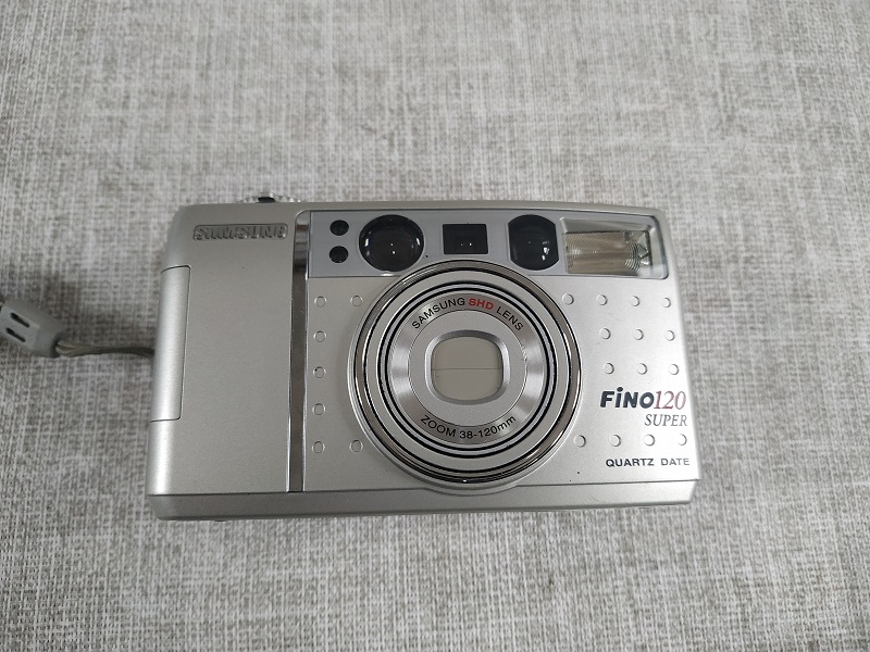 Пленочный фотоаппарат samsung fino. Пленочный самсунг e1. Samsung fino 300 Quartz Date