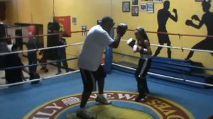 10 yr old boxer Liza Llanos working the pads