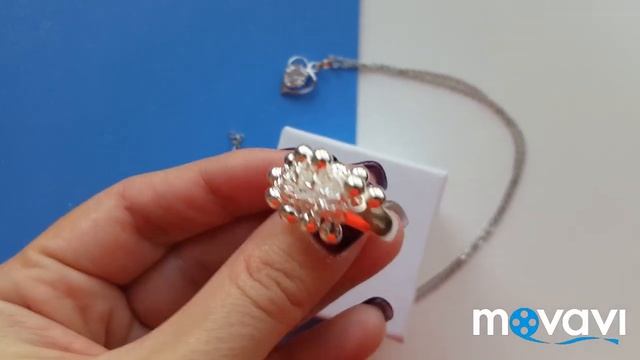 Оригинальное кольцо с подвесками.