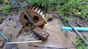 aftermath of a heavy rain and what I did to prevent my shop from flooding.