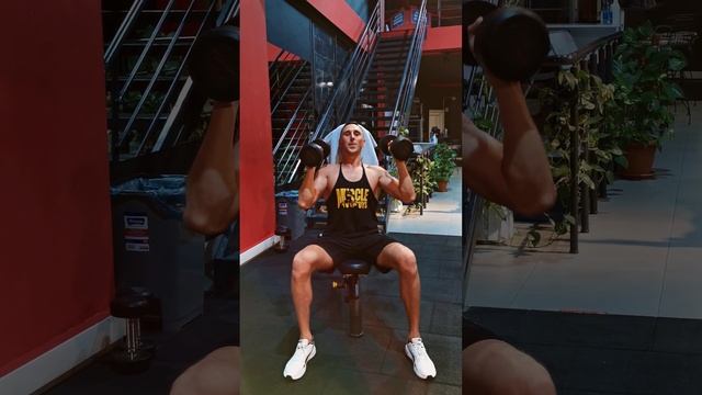 How To Do: Dumbell Seated Alternate Press. (Подъем гантелей вверх сидя на скамье поочередно)